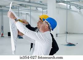 Architects looking at plans