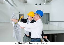 Architects looking at plans