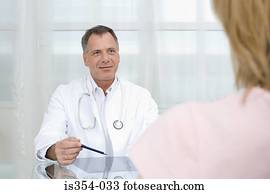 Doctor giving consultation Doctor giving consultation