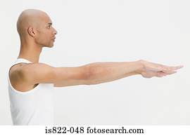Man stretching his arms out
