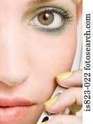 Woman using a cellular telephone