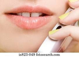 Woman using a cellular telephone