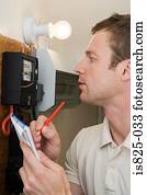 Man looking at meter