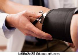 Mid adult doctor using stethoscope and blood pressure cuff on patient, close up