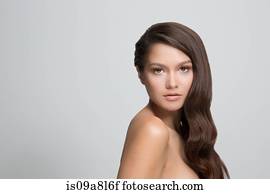 Portrait of woman with long brown hair