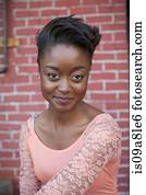 Portrait of young woman wearing lace top