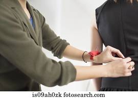 Fashion designer pinning top