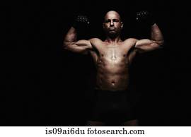 Boxer with arms raised