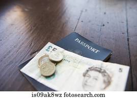 British banknote, coins and passport