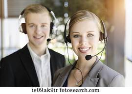 Call centre team wearing headsets