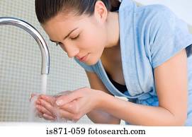 Woman washing hands
