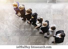 Overhead view of business team in a row