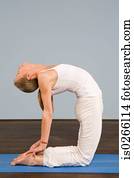 A mature woman in a yoga position