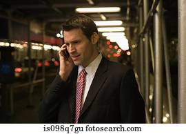 Businessman using a cellular telephone
