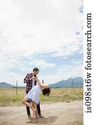 Couple dancing in remote setting