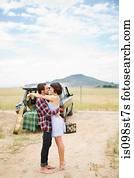 Loving couple on road trip