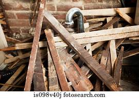 Pile of rubble and brick wall