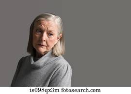 Senior woman looking worried Senior woman looking worried