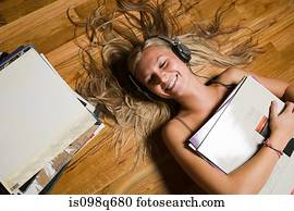 Teenage girl listening to music