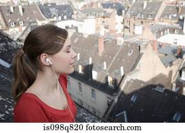 Teenage girl listening to music