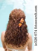 Woman by swimming pool