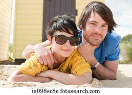 Young couple by beach hut