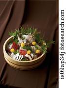 Sliced raw fish in bowl