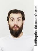 Portrait of bearded man in white t-shirt