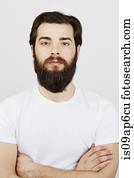 Portrait of bearded man in white t-shirt