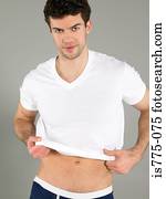 Man putting t-shirt on