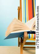 Open book on a deckchair