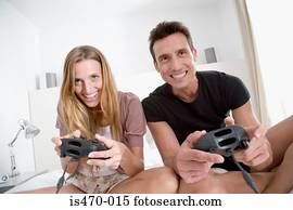 Couple playing computer game