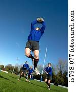 jogador rúgbi, pegando bola