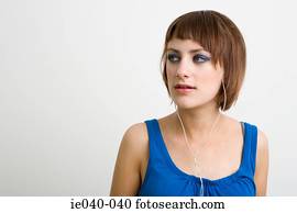 Teenage girl listening to music