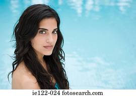 Young woman swimming pool