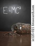 Jar and money in classroom