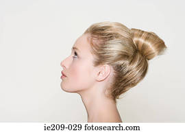 Profile of a woman with a hairstyle