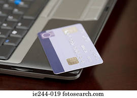A laptop and a credit card