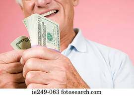 Man with bundle of banknotes