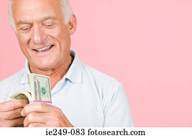 Man with bundle of banknotes