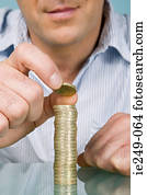 Man with stack of pounds