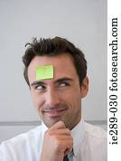 Man with question mark on his forehead