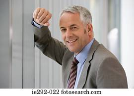 Smiling gray haired businessman
