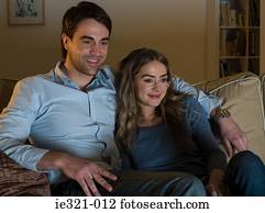 A couple watching tv