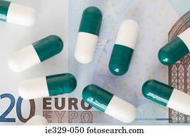 Capsules on a euro note