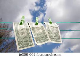 Dollar bills on a clothesline