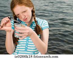 A girl doing an experiment