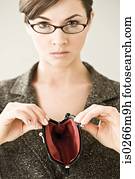 A woman holding an empty purse