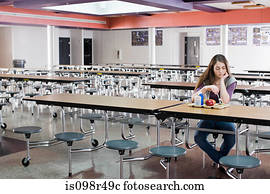 Girl alone at lunch