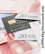 Credit card and euro banknotes
